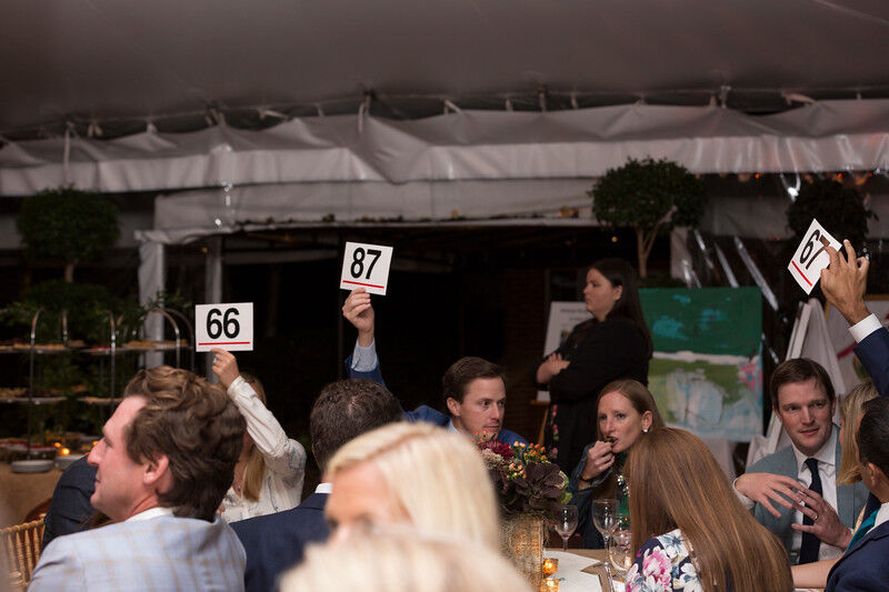 Bid cards up at an open-air event.