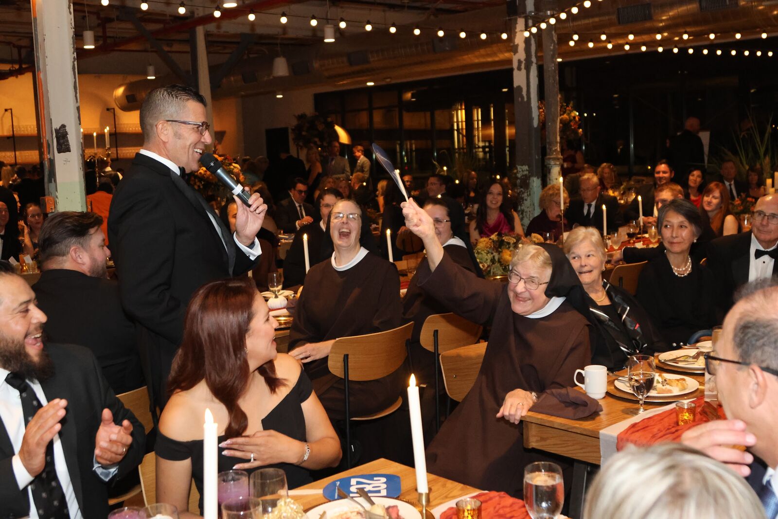 Engaging directly with the crowd during the fund-a-need.