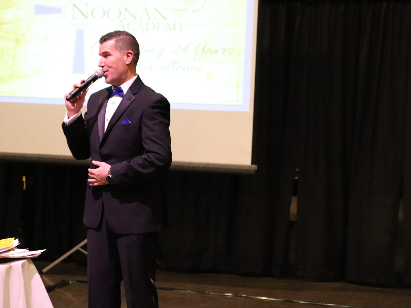 Benevolent Auctions team consulting with an event planner
